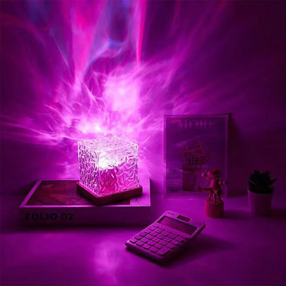 Aurora projector LED lamp with colorful northern lights effect for home decor and sleep ambiance.